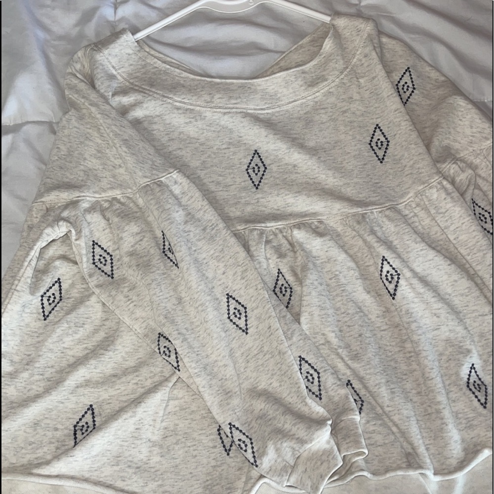 white/cream sweater with design